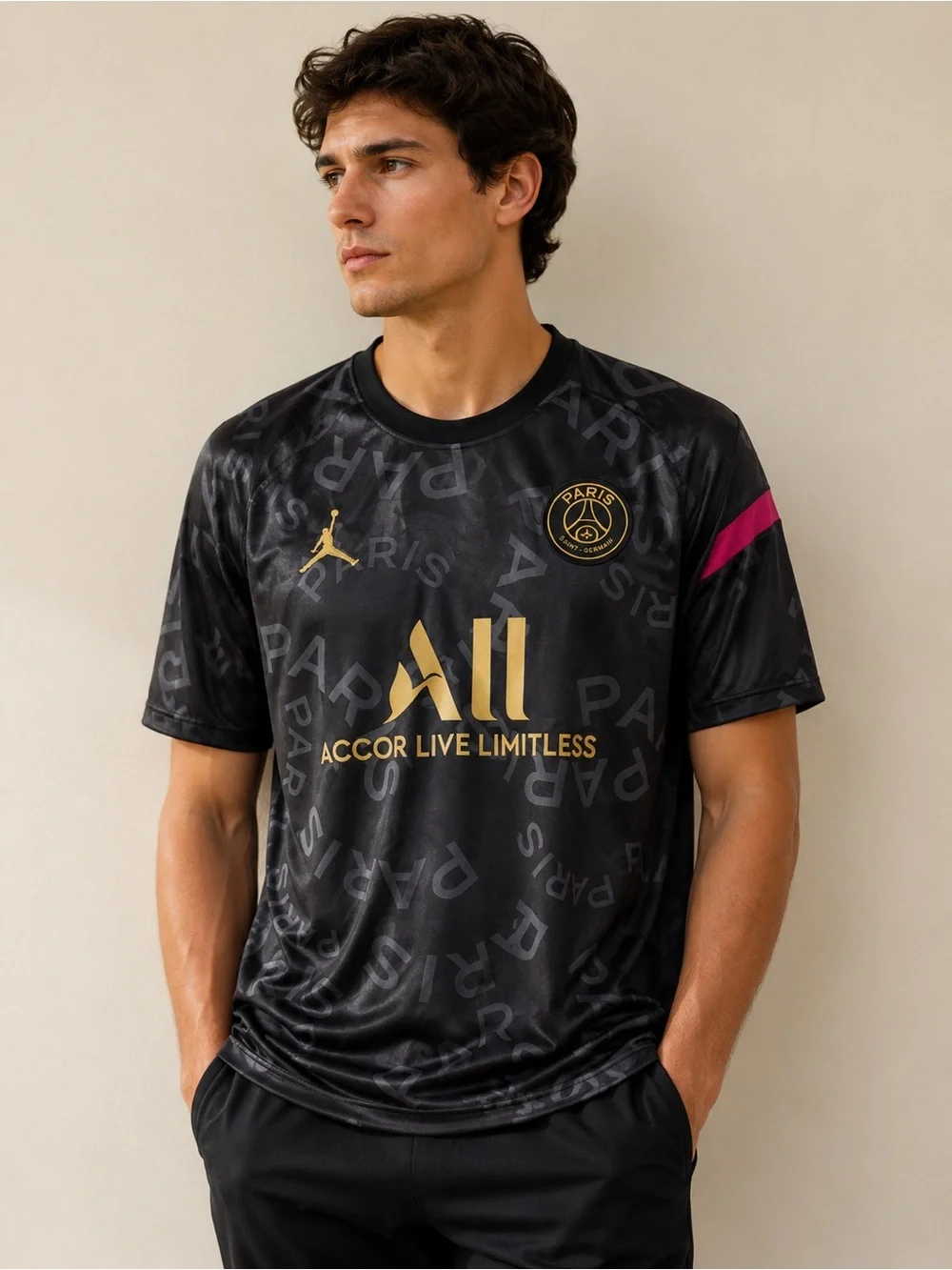 Jordan Men’s Black Jersey with Gold Logos and Pink Sleeve Detail
